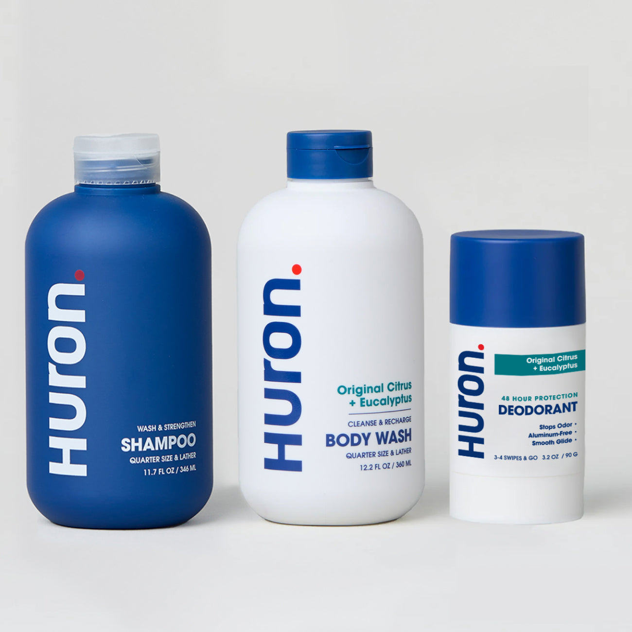 Three Huron personal care products in Original Citrus + Eucalyptus scent: shampoo, body wash and deodorant stick. #scent_original citrus + eucalyptus