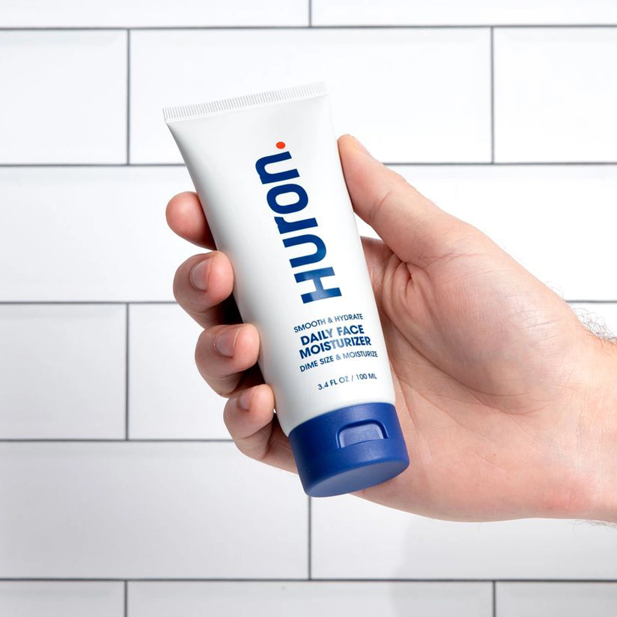 Huton Daily Face Moisturizer in a hand, 4.8 rating, $16