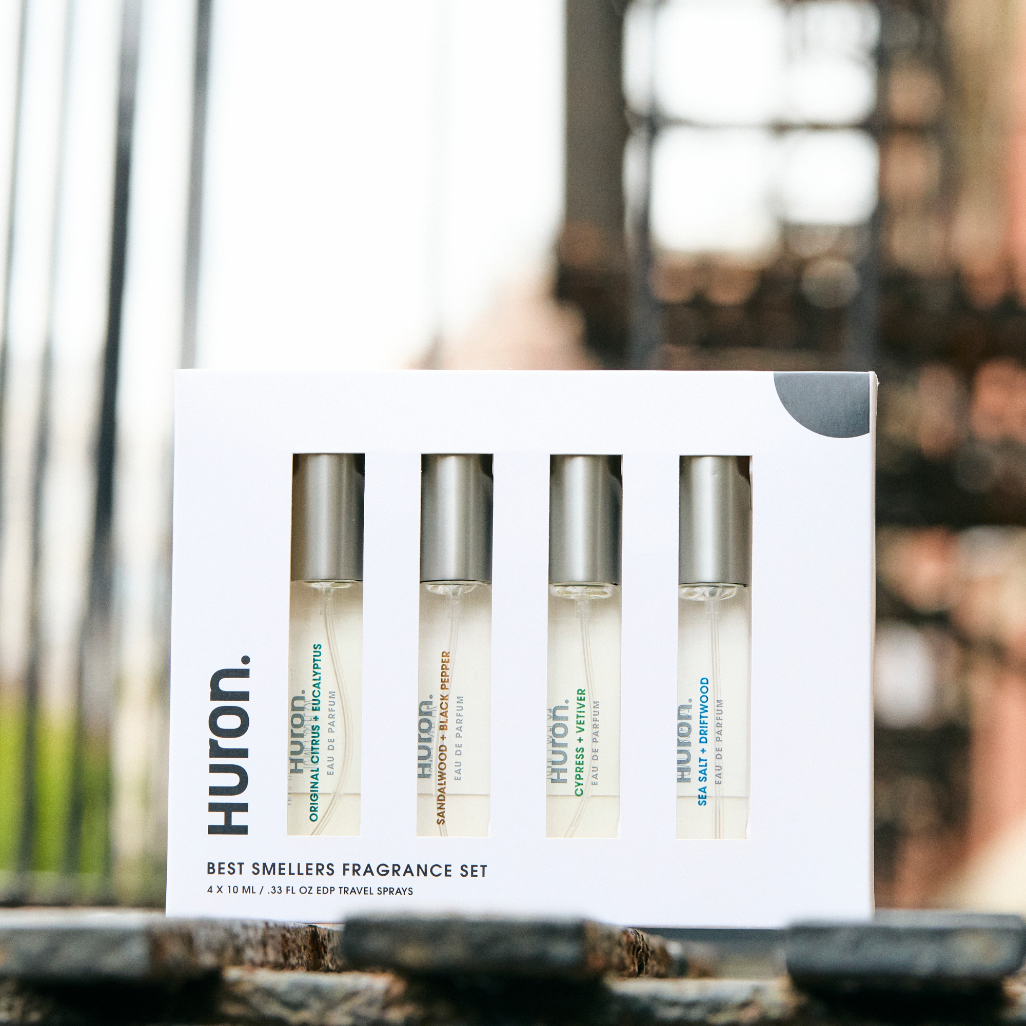 Huron Best Smellers Fragrance Set with four travel spray bottles in a white box, labeled Citrus & Vetiver, Cedar & Spice, Green & White, and Black & Tobacco.