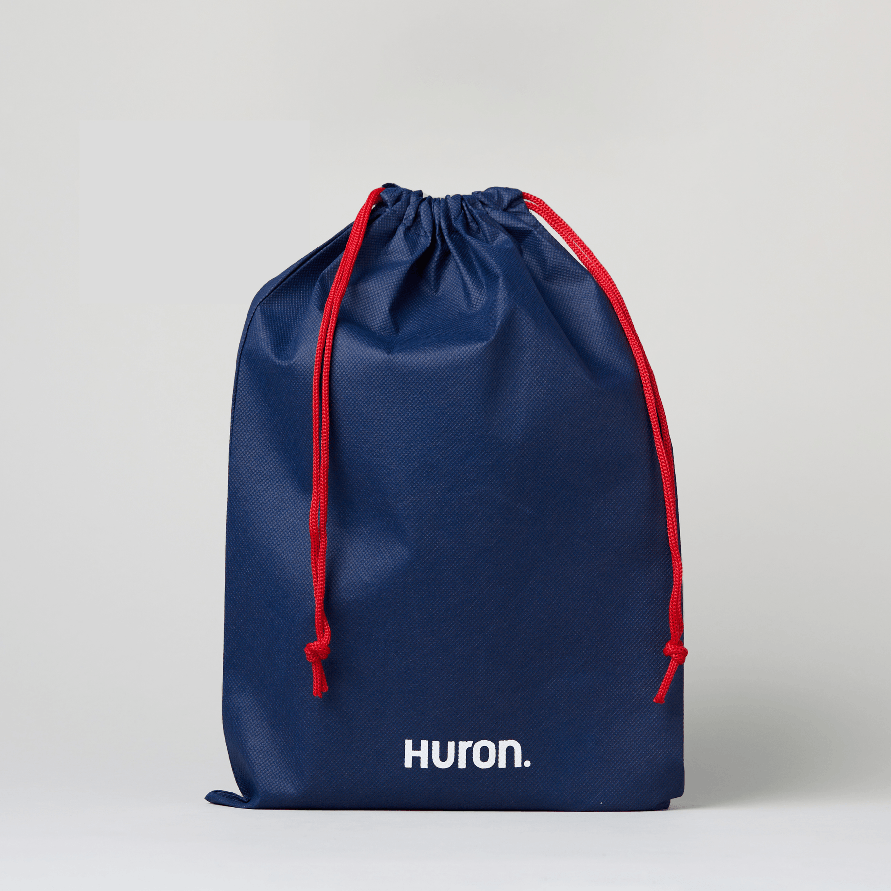 Blue drawstring bag with red drawstrings and 'HURON.' text