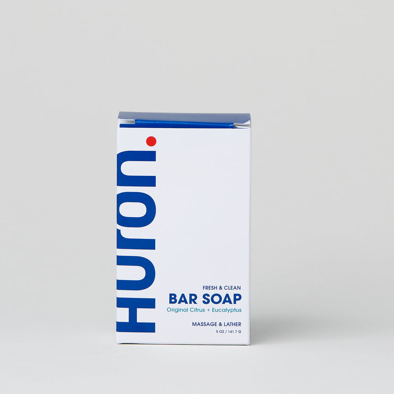 Huron Bar Soap packaging in white with blue text, featuring 'FRESH & CLEAN' and 'Original Citrus + Eucalyptus'