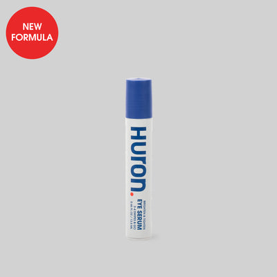 Huron Eye Serum in a bottle with a blue cap, labeled 'NEW FORMULA'