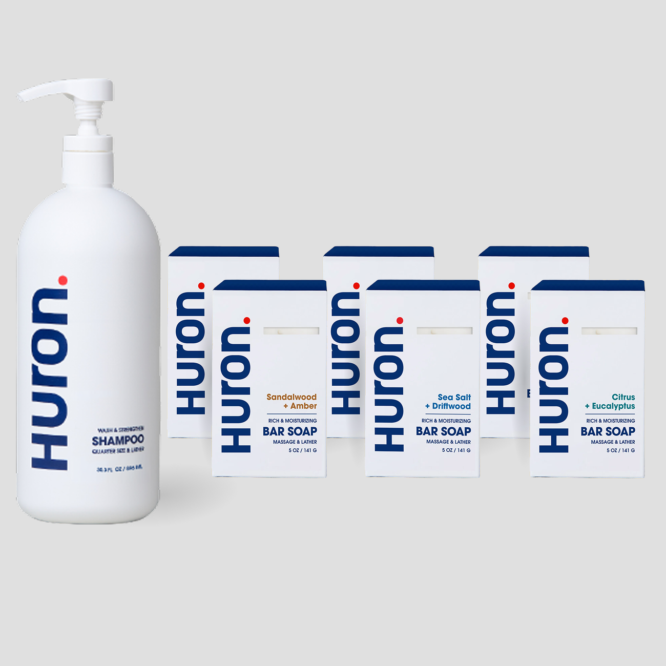 Huron shampoo pump bottle with six Huron bar soap boxes (Sandalwood + Amber; Sea Salt + Driftwood; Citrus + Eucalyptus)