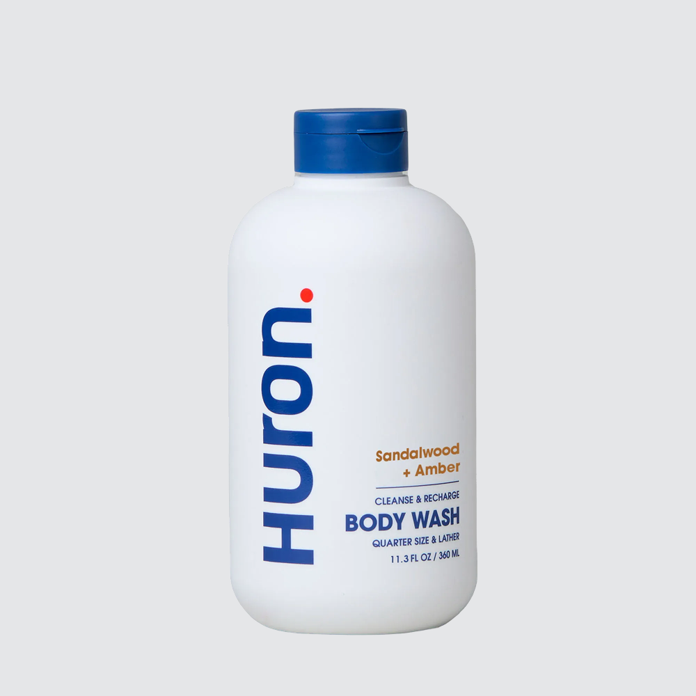 Huron body wash bottle - Sandalwood + Amber; CLEANSE & RECHARGE; BODY WASH; 11.3 FL OZ / 340 ML #scent_sandalwood + amber