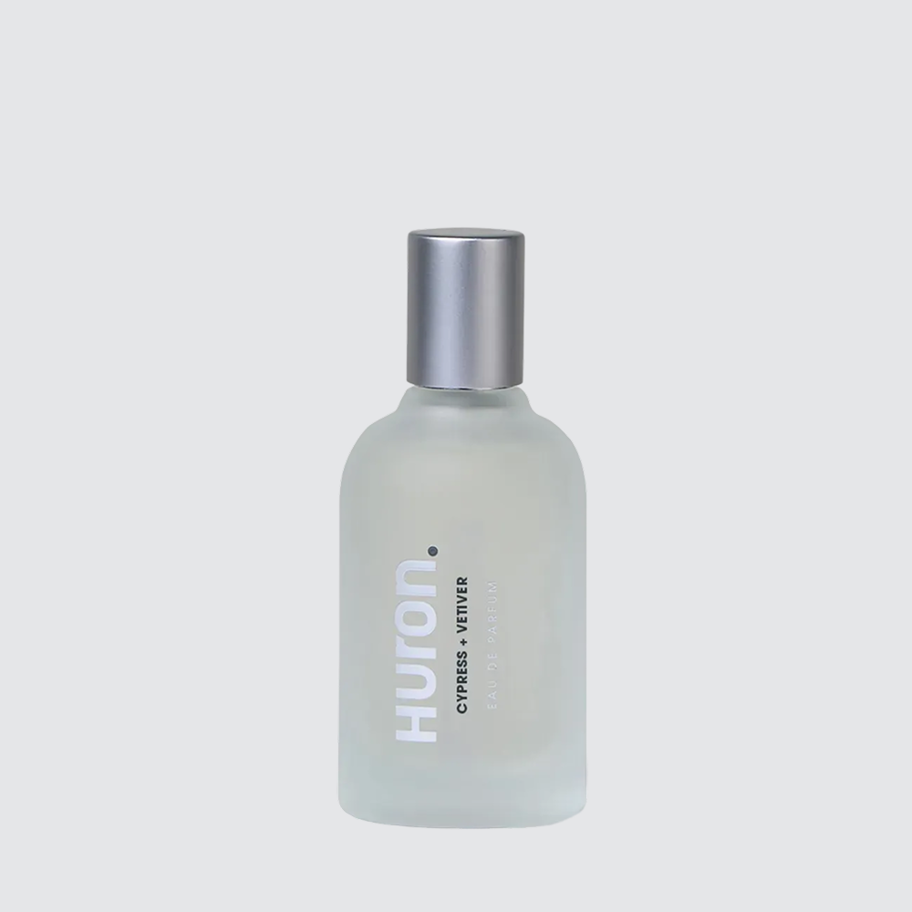 Frosted glass bottle of Huron cologne with text 'CYPRESS + VETIVER EAU DE PARFUM' and silver cap #scent_cypress + vetiver