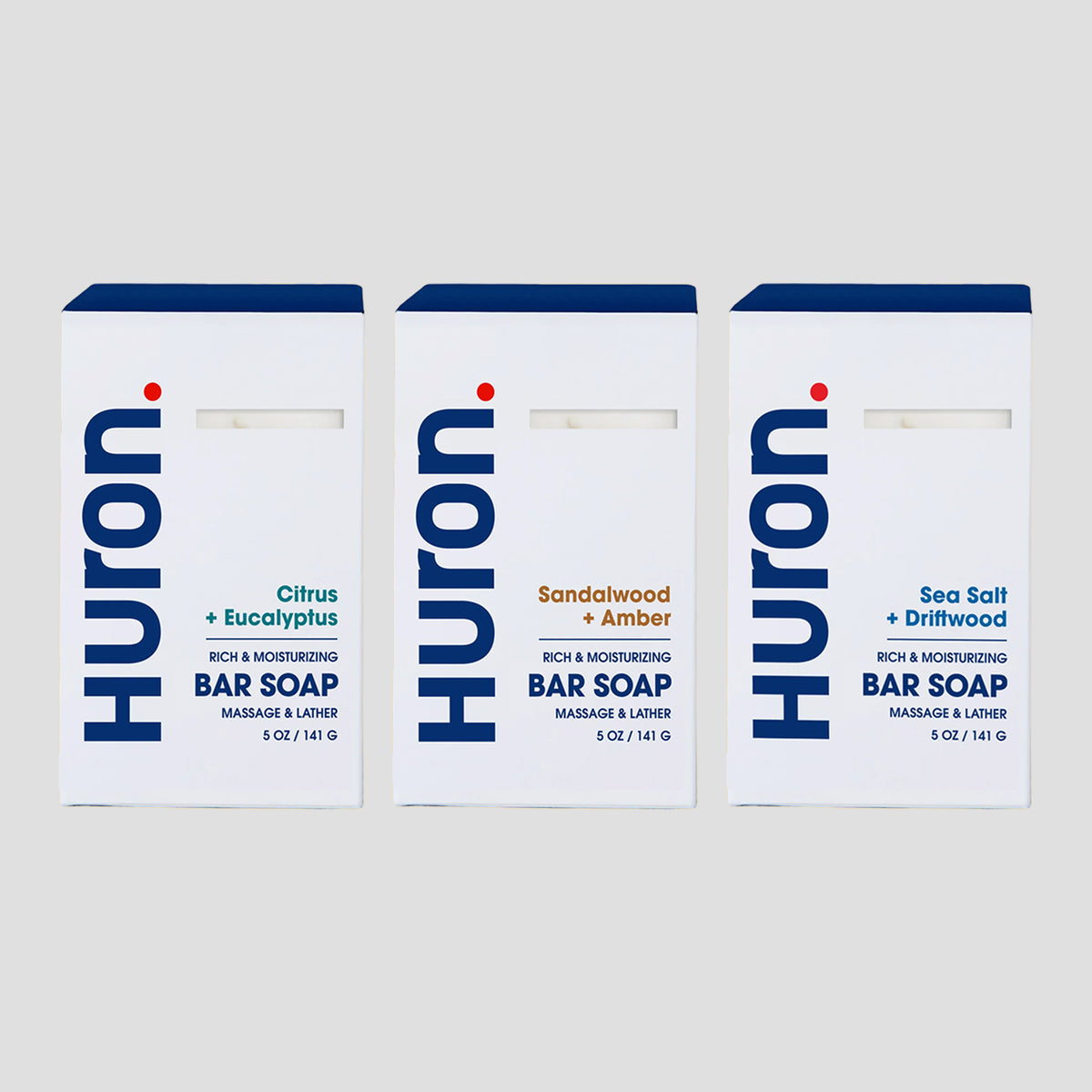 Front view of Huron Bar Soap 3-pack showcasing three boxed scent variants on light gray background