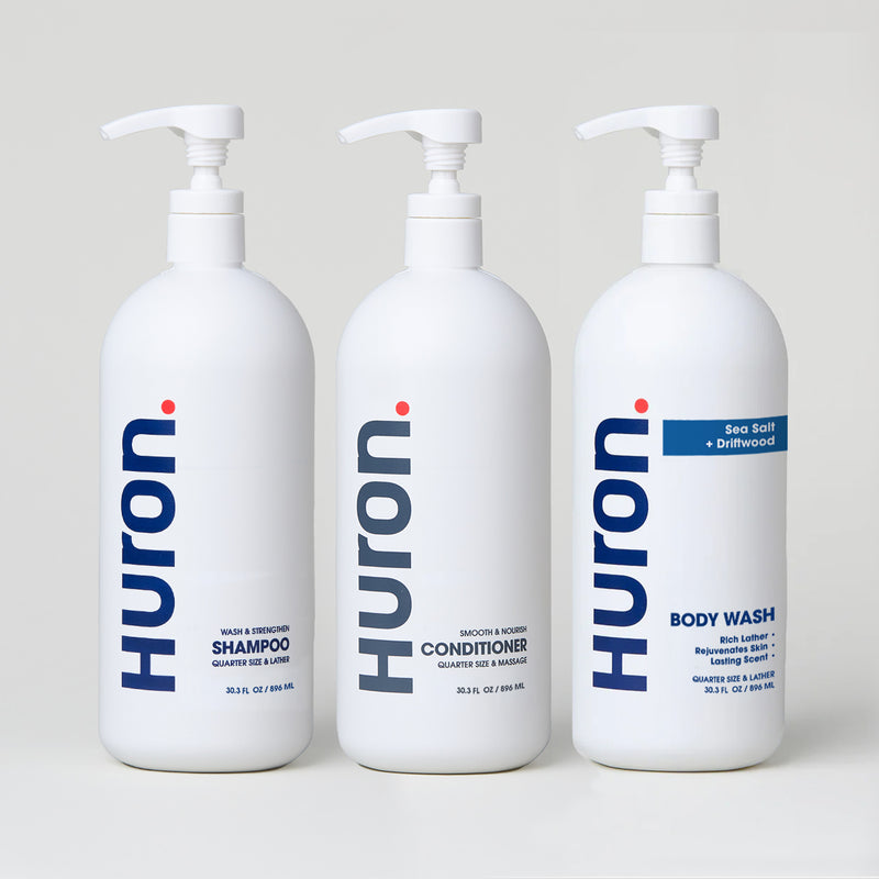 Three bottles of Huron products: Shampoo, Conditioner, and Body Wash (Sea Salt + Driftwood) #scent_sea salt + driftwood