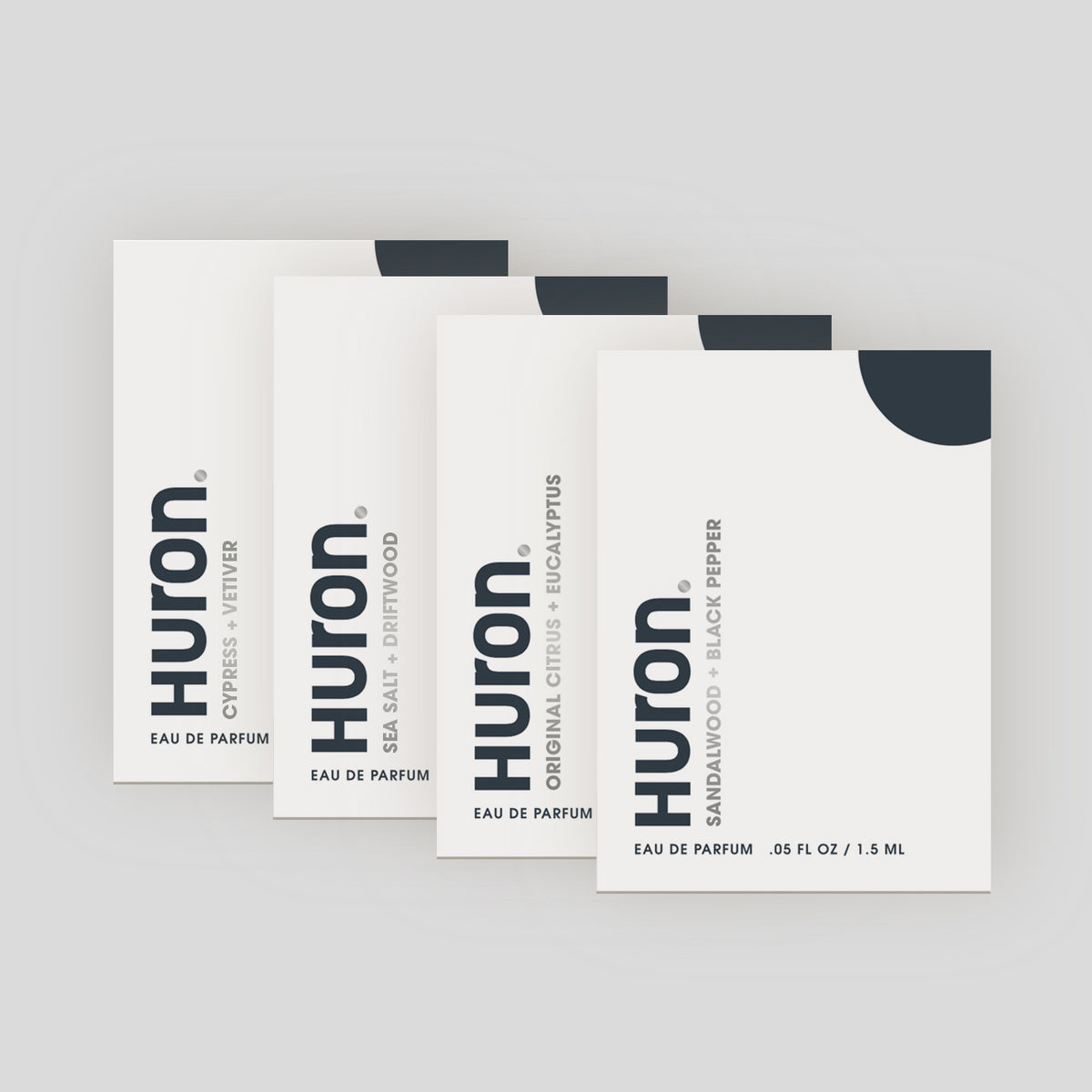 Four Huron cologne sample packs: Cypress Vetiver, Eucalyptus, Original Citrus, Sandalwood Black Pepper.