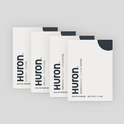 Four Huron cologne sample packs: Cypress Vetiver, Eucalyptus, Original Citrus, Sandalwood Black Pepper.
