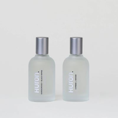HURTON Sandalwood Black Pepper and Cypress Litter cologne bottles