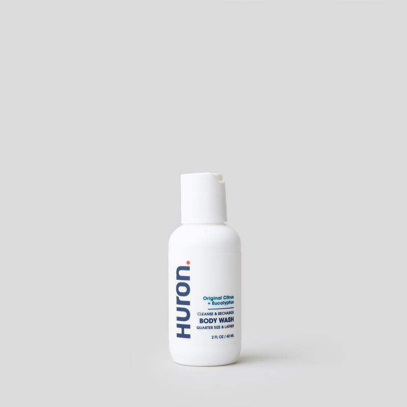 Huron Body Wash Travel Size bottle with blue and white label #scent_citrus + eucalyptus