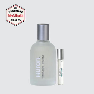 Frosted Huron cologne bottle and travel spray; ORIGINAL CITRUS EUCALYPTUS label; 2023 GROOMING MensHealth AWARDS badge. #scent_citrus + eucalyptus 