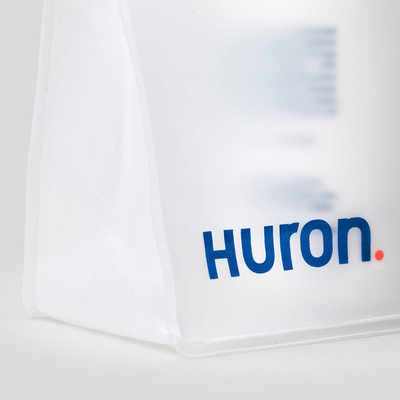 Close-up of Huron Deluxe Sample Kit packaging with logo