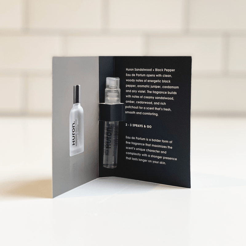 A sample vial of Huron Eau de Parfum with a description of its scent notes.eucalyptus